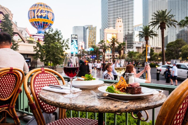 Dining table and dinner on the patio of Mon Ami Gabi Las Vegas