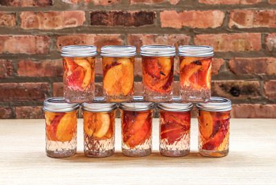 pickled peachesin mason jar