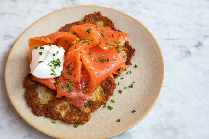 Summer House Leek Latkes topped with wild salmon