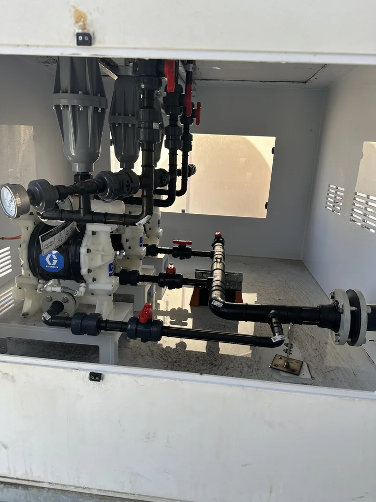 LibertyCES electric chemical dosing skid — industrial wastewater pH control system installed at major U.S. cheese plant.
