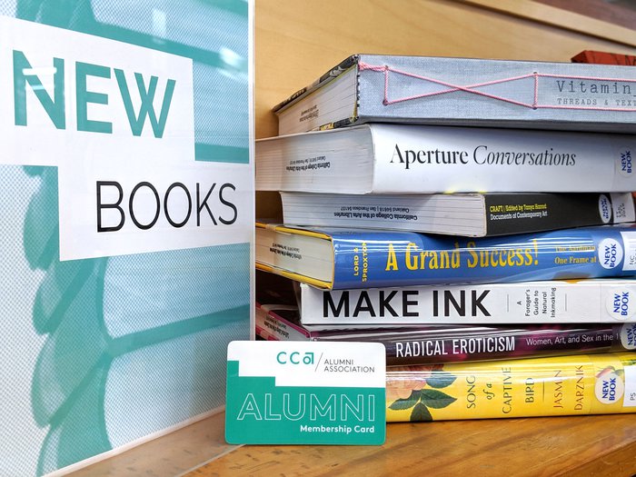 Alumni card with new books
