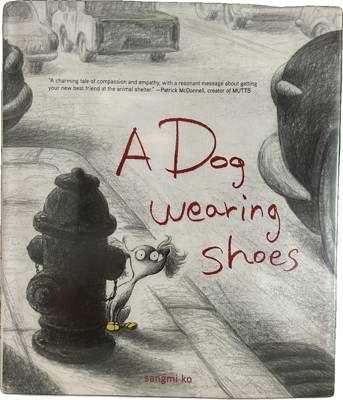 A Dog Wearing Shoes