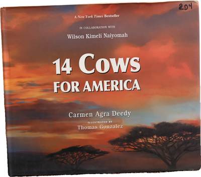 14 Cows for America