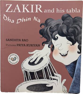 Zakir and his tabla Dha Dhin Na
