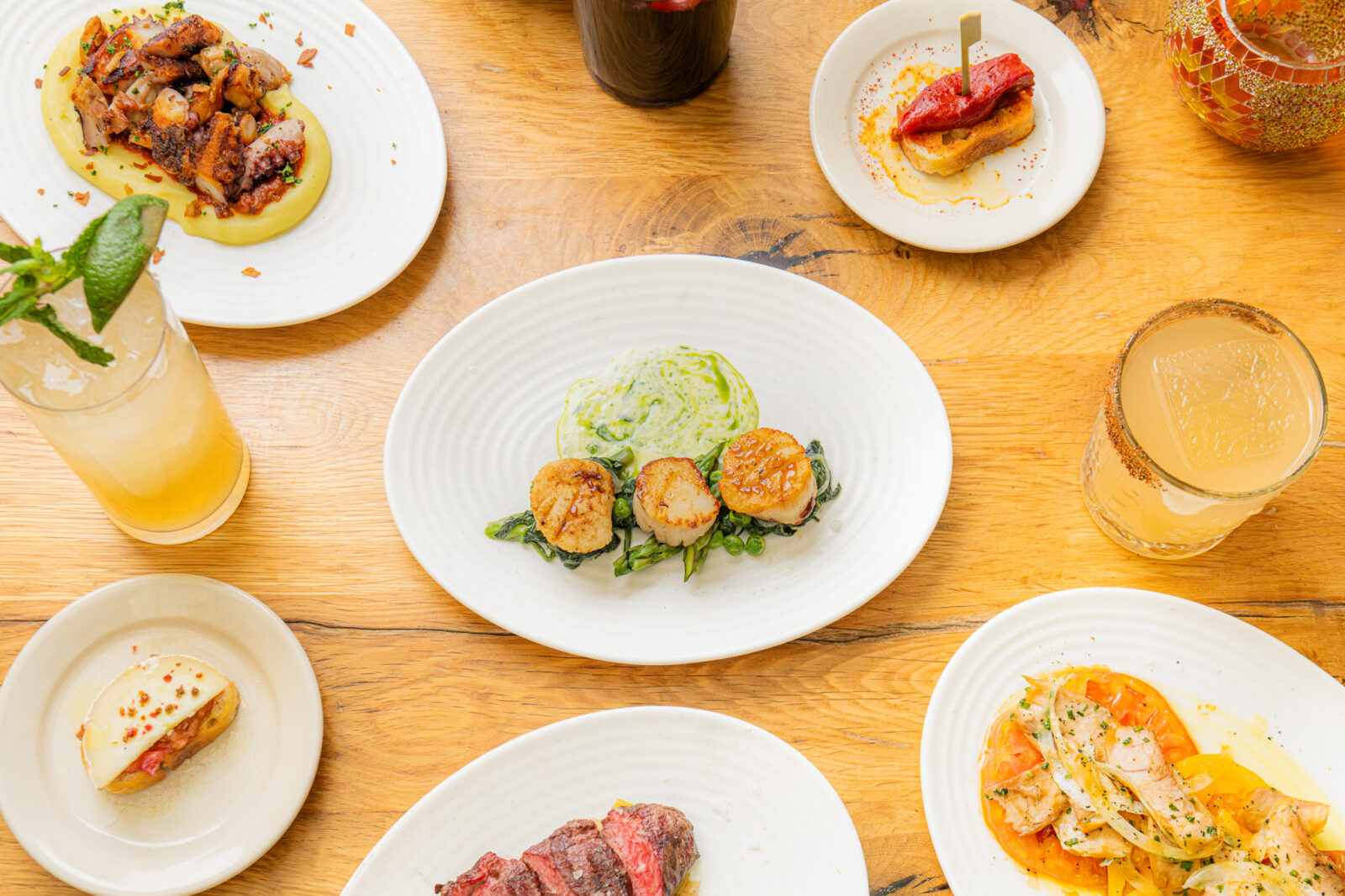 Spread of Lil' Ba-Ba-Reeba!'s tapas and cocktails available during Friday Lunch hours
