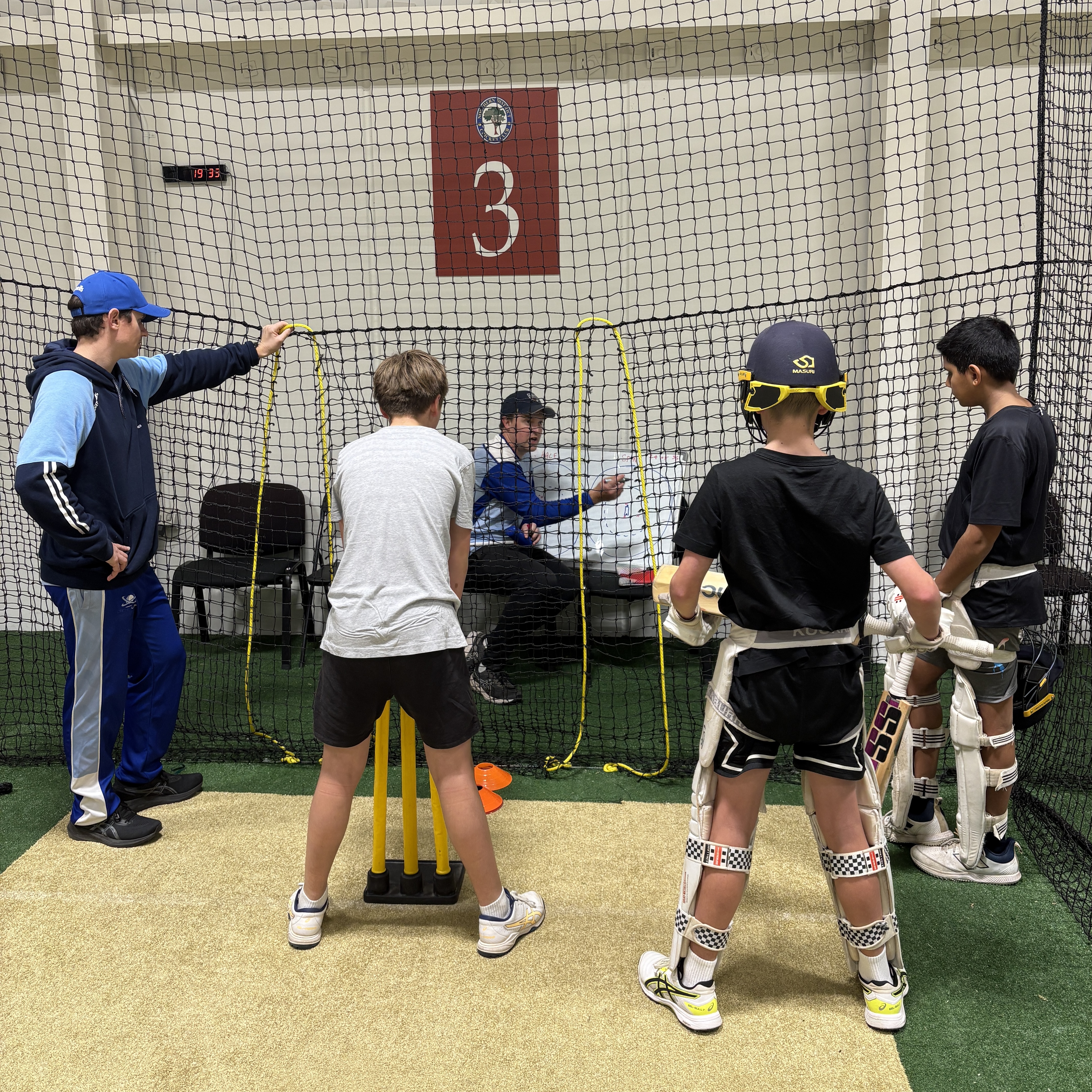 Players & Coaches Setting a Field During a Net Scenario