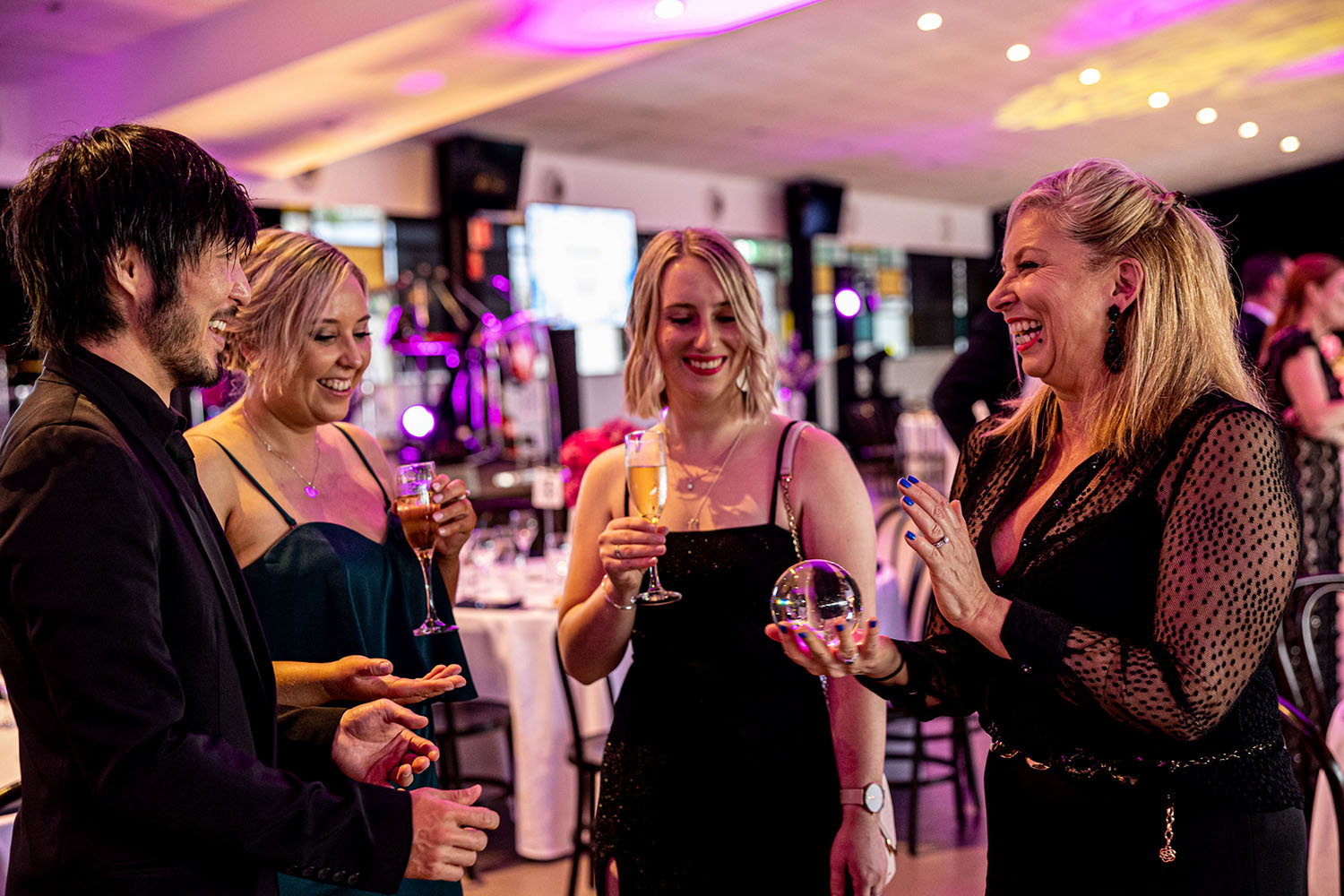 Roving magician for hire in Sydney Corproate event