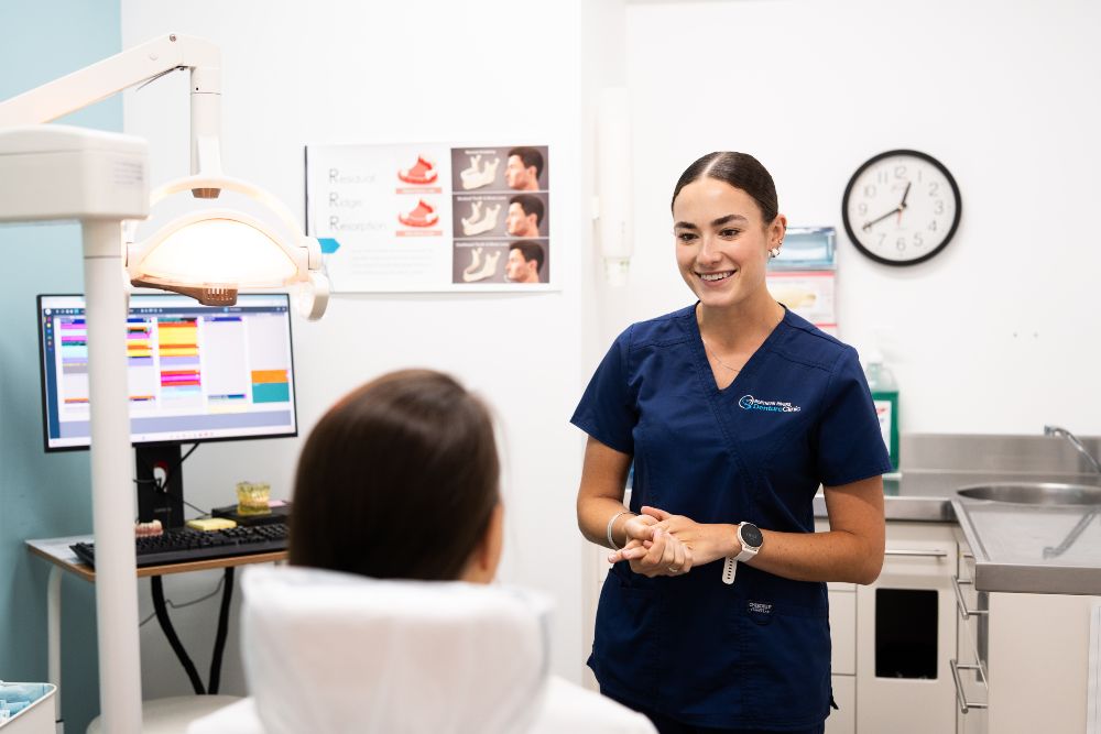 Tweed Heads dental prosthetist talking to patient about immediate dentures