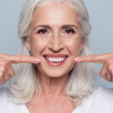 Can I add teeth to my partial denture?