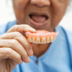 How many hours a day should you wear your dentures?