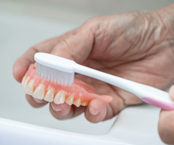 How to remove denture adhesive.