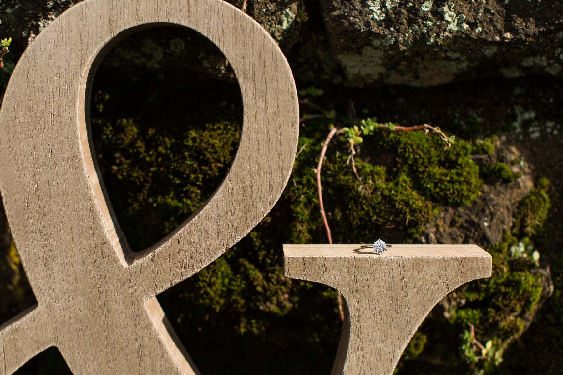 Wooden letter & with the Engagement Ring