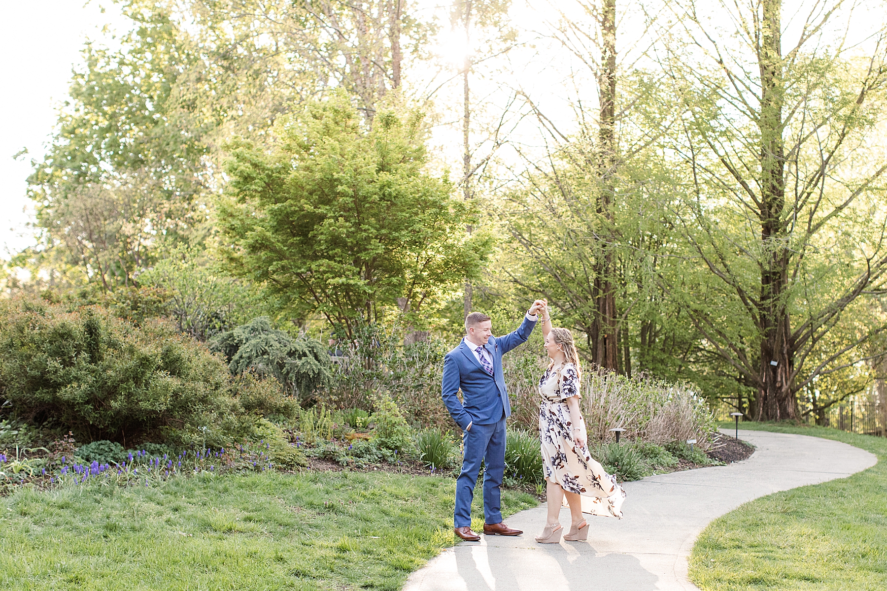 Engaged Couple Dancing in Deep Cut Gardens