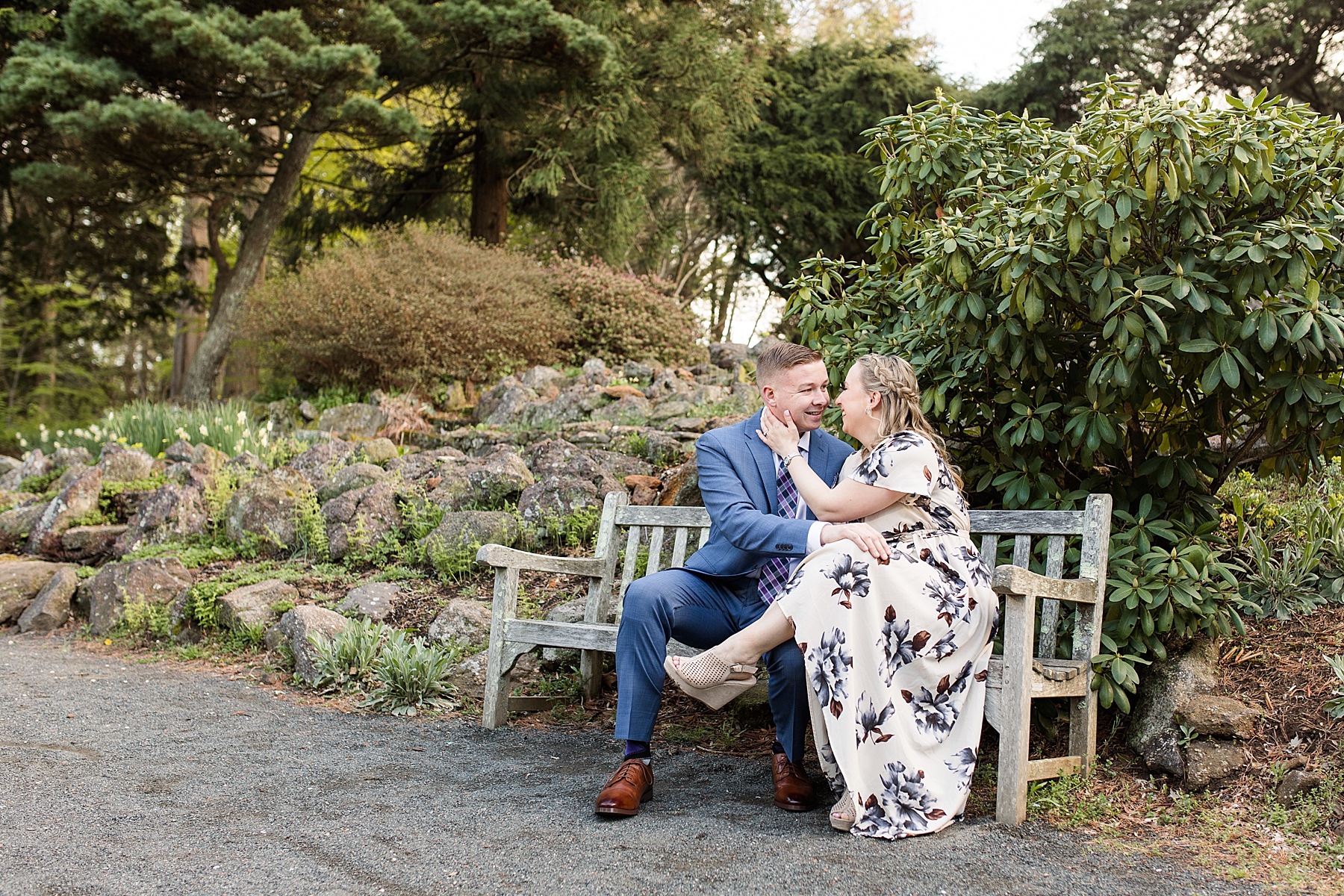 Engagement Couple Sitting in Deep Cut Gardens