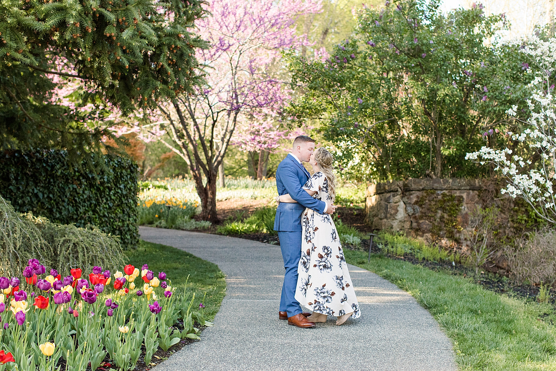 Engaged Couple Kissing in Deep Cut Garden