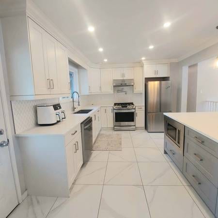 Renovated 4BR House | Close to SkyTrain, Bus stop; Superstore – Guildford — photo 5 of 12