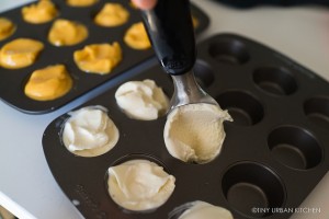 Little Passports Blog Make Your Own Mooncakes Placing Dough in muffin tin