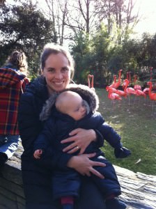 Little Passports Blog Raising Global Citizens in Paris Mary Nicklin and Baby with Flamingos in background