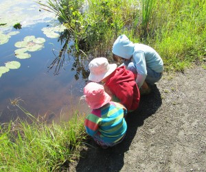 Mom in Montreal Three Children at Creek