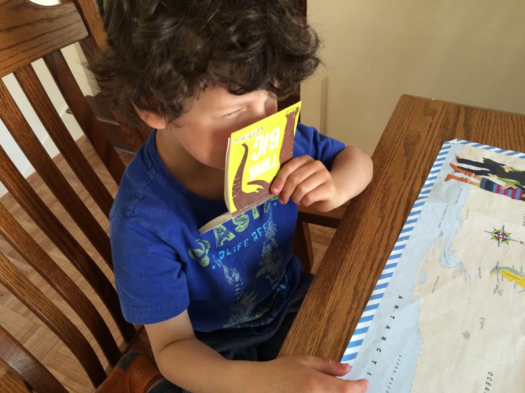 Little Passports Blog Noah Smelling Poo Paper