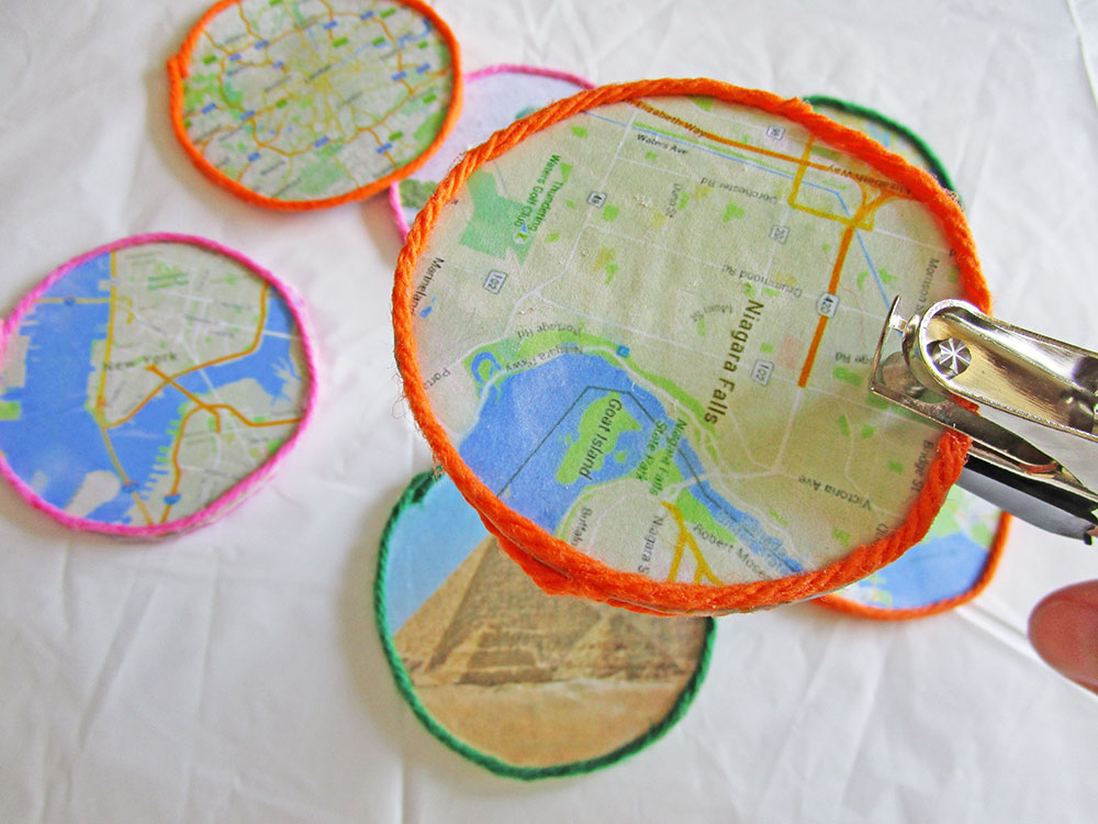 Little Passports Blog DIY Map Craft Holepunching Circles