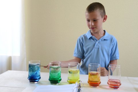 Boy Playing Water Xylophone