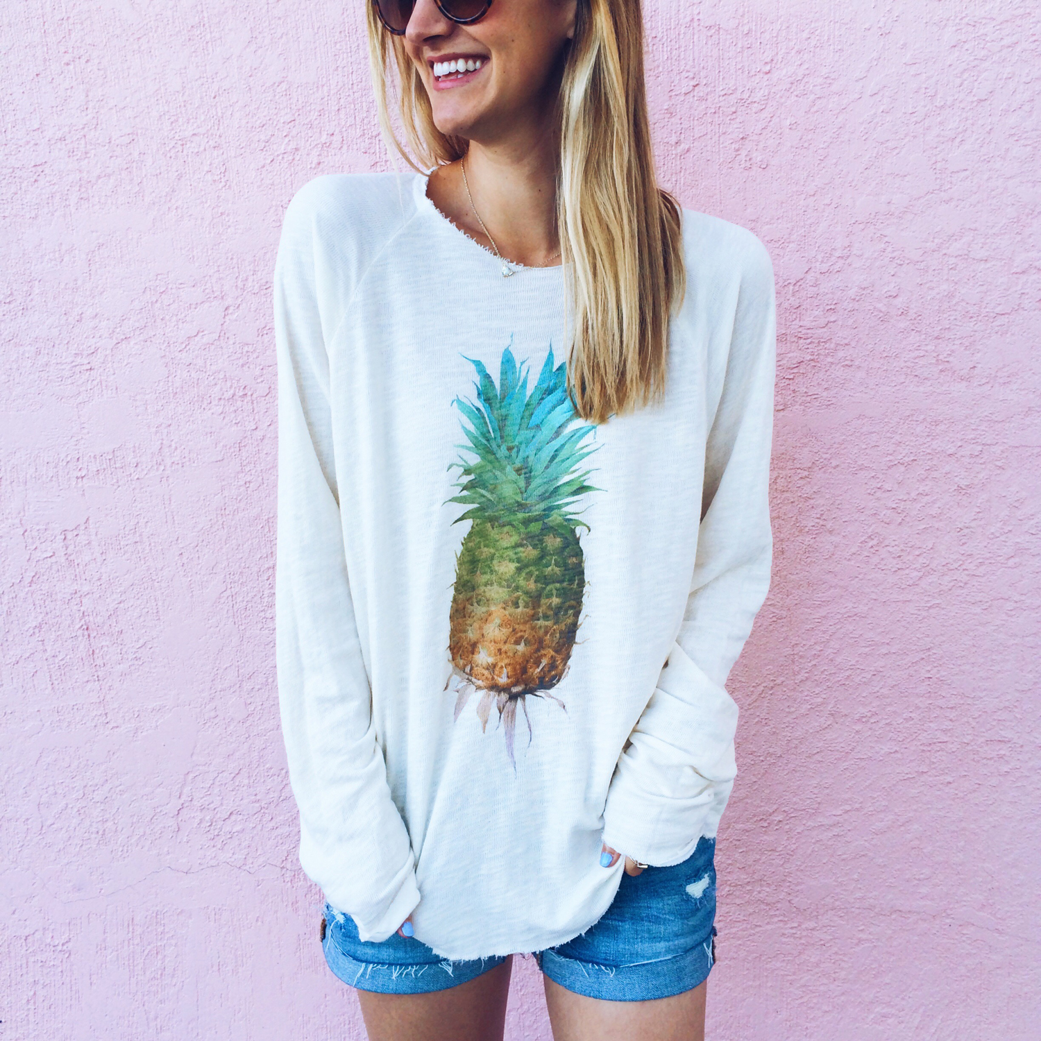 livvyland-blog-olivia-watson-austin-texas-fashion-blogger-wildfox-pineapple-sweater-cutoff-denim-pink-wall