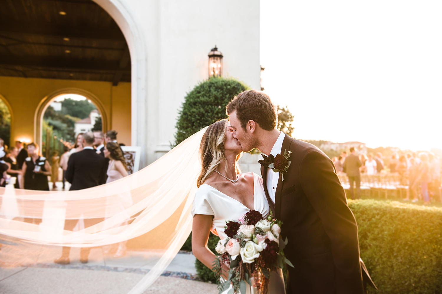 livvyland-blog-olivia-watson-wedding-villa-del-lago-austin-texas-fall-blush-burgundy-classic-romantic-bride-groom-first-kiss-1