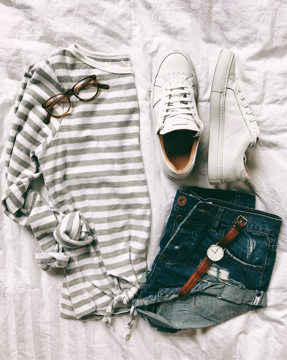 livvyland-blog-olivia-watson-flat-lay-outfit-striped-tie-front-top-white-greats-royal-sneakers-one-teaspoon-bandit-shorts