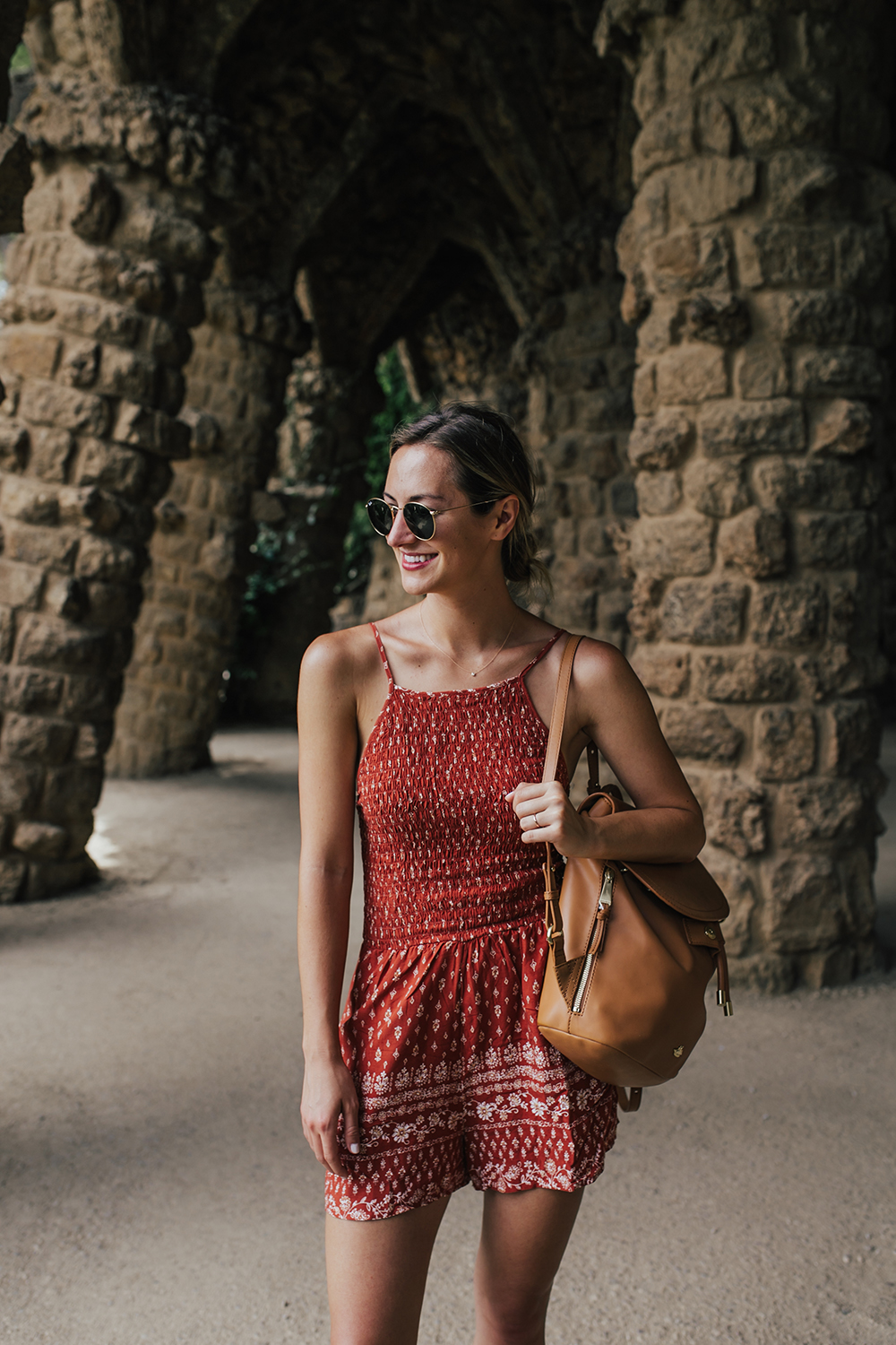 livvyland-blog-olivia-watson-travel-fashion-blogger-barcelona-costa-brava-spain-friends-trip-air-bnb-park-gruell-romper-travel-backpack