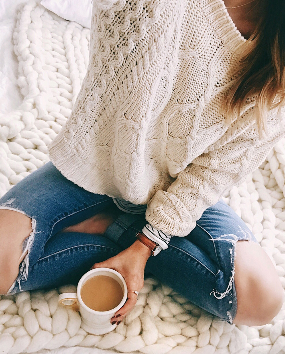 livvyland-blog-olivia-watson-fall-outfit-cableknit-sweater-layers-striped-tee-chunky-knit-throw-blanket