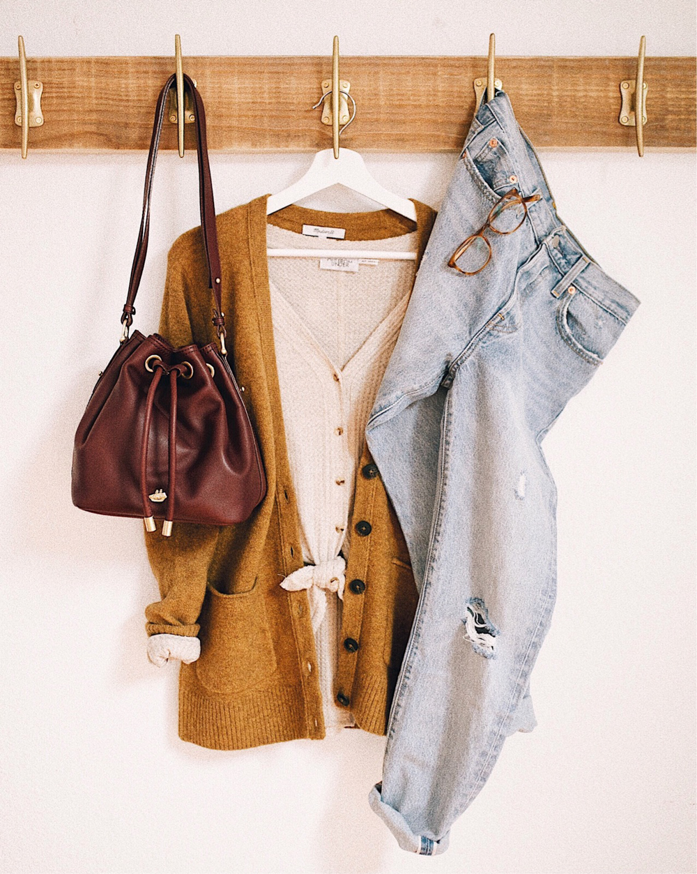 livvyland-blog-olivia-watson-fall-outfit-idea-grandpa-cardigan-thermal-top-levis-501-jeans-brahmin-handbag