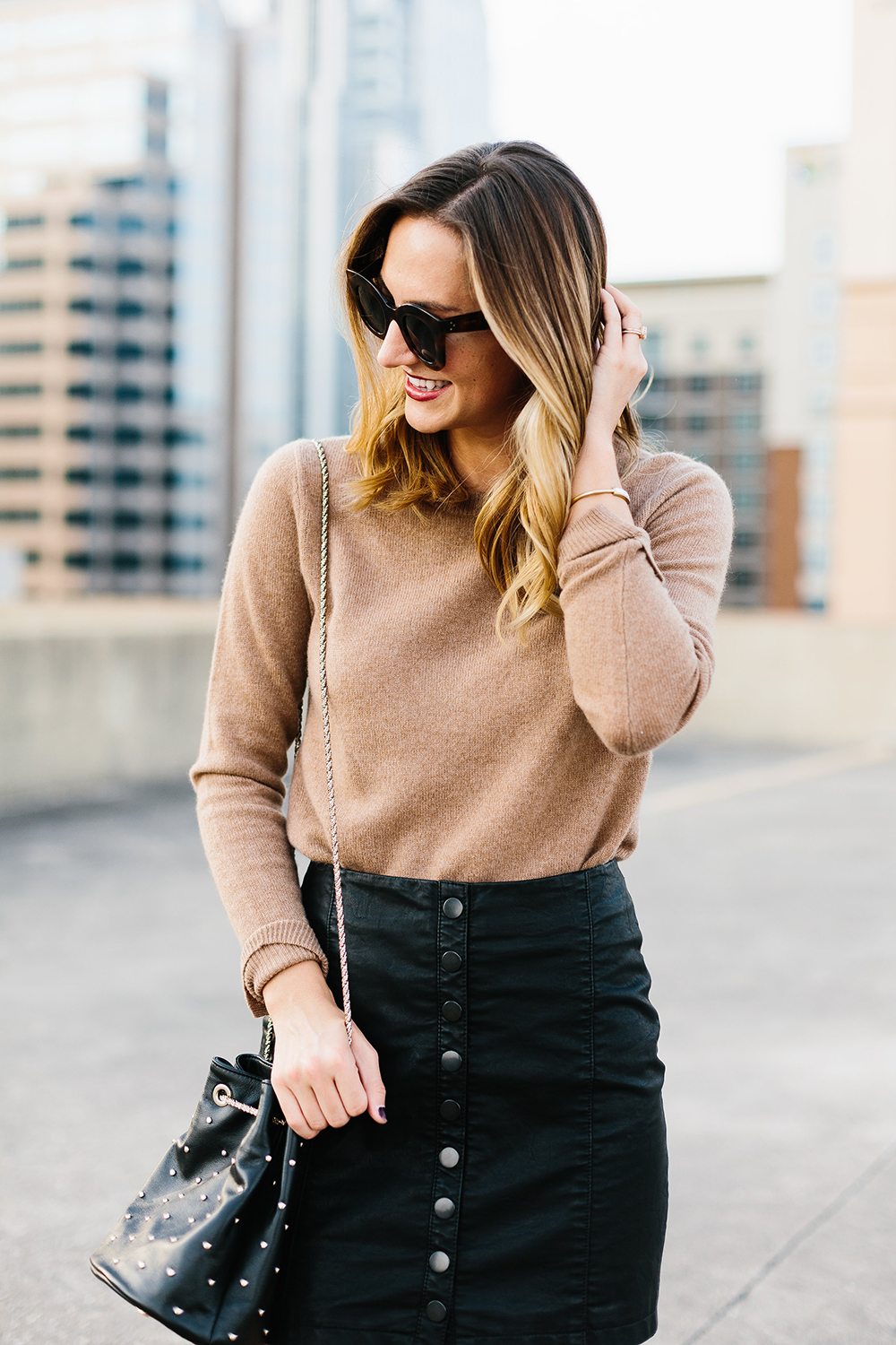 livvyland-blog-olivia-watson-free-people-vegan-leather-mini-skirt-cashmere-tan-sweater-sezane-studded-bucket-bag-5