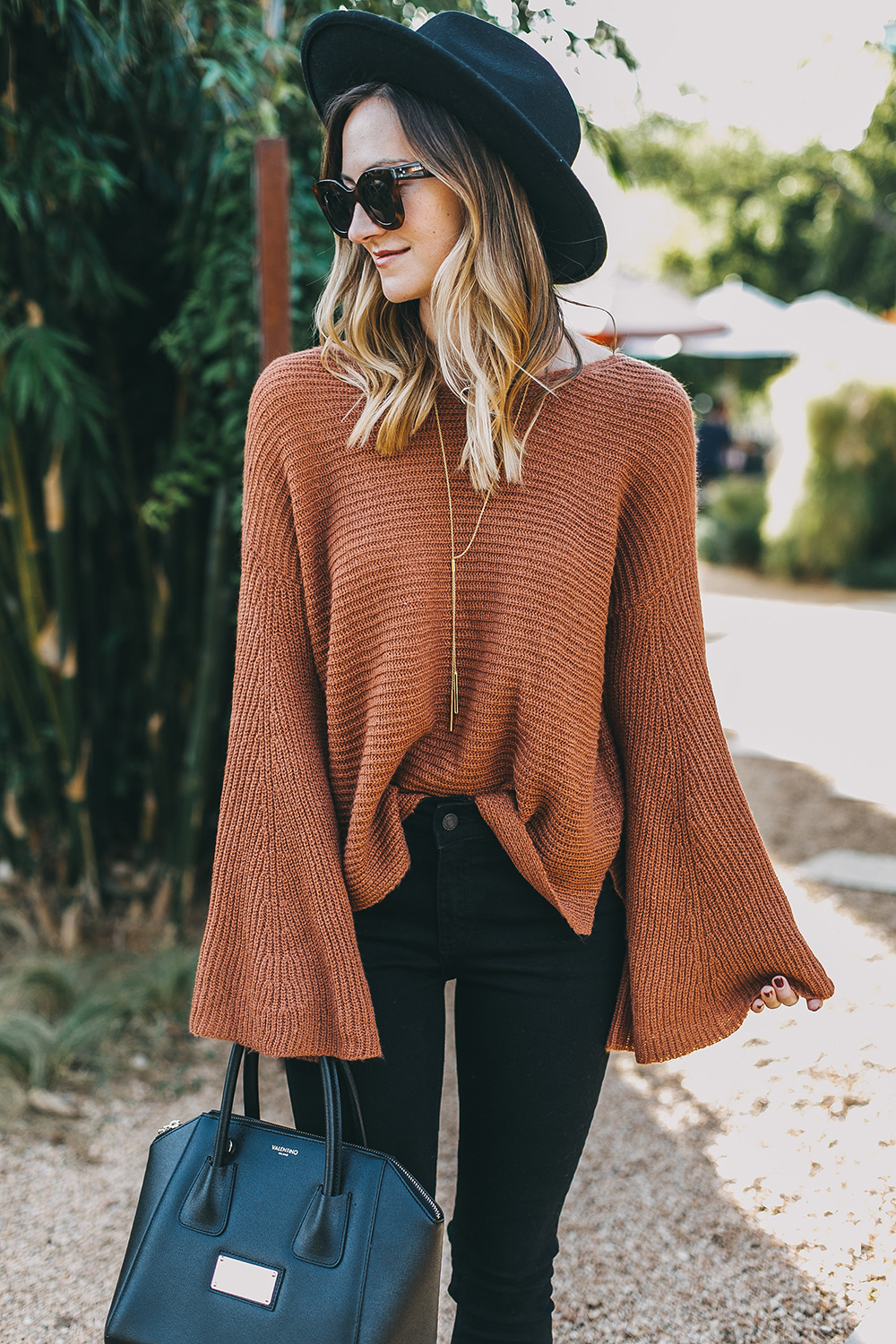 livvyland-blog-olivia-watson-austin-texas-fashion-lifestyle-blogger-fall-orange-slouchy-sweater-black-skinny-jeans-outfit-boho-fall-idea-9