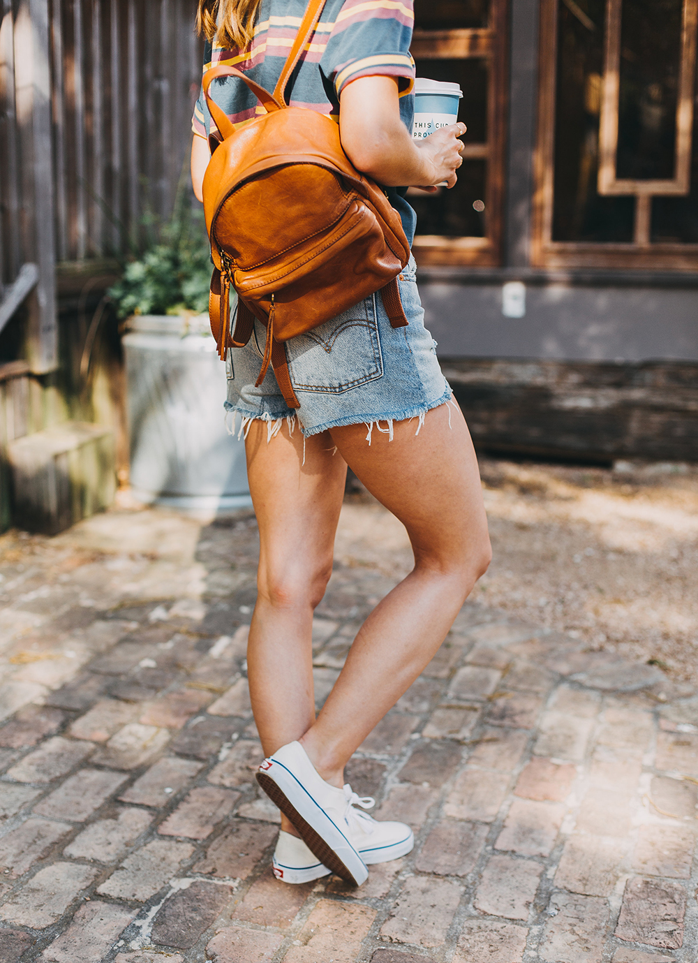 livvyland-blog-olivia-watson-austin-texas-fashion-style-urban-outfitters-striped-vintage-tee-levis-denim-wedgie-shorts-madewell-mini-leather-backpack-2