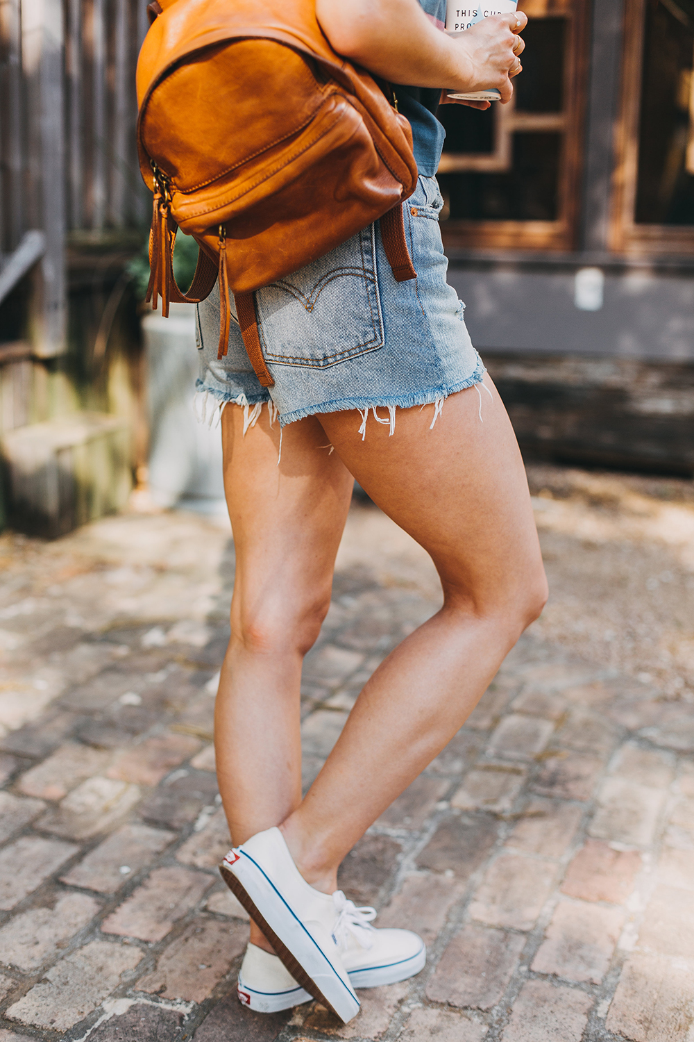 livvyland-blog-olivia-watson-austin-texas-fashion-style-urban-outfitters-striped-vintage-tee-levis-denim-wedgie-shorts-madewell-mini-leather-backpack-4