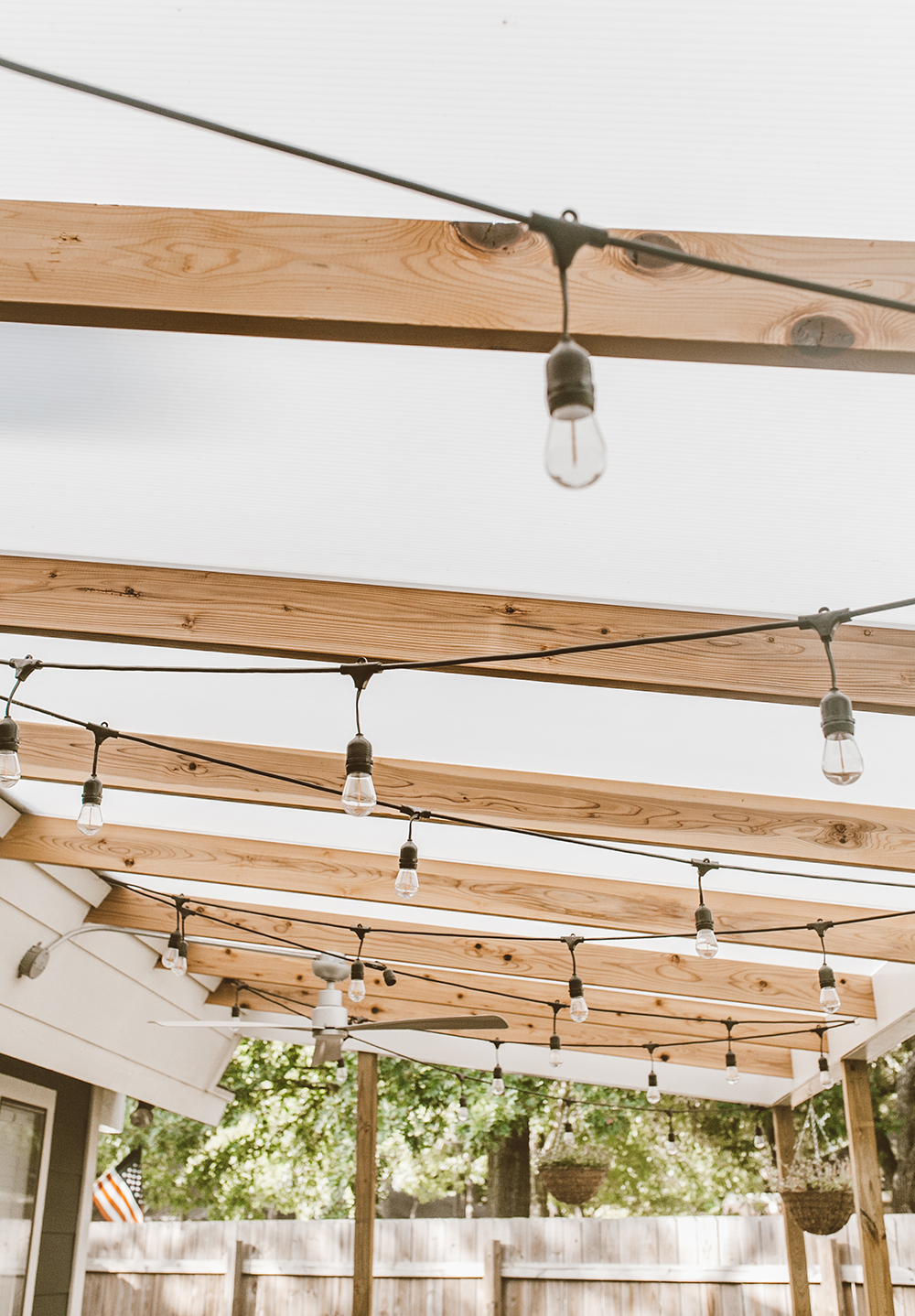 livvyland-blog-olivia-watson-backyard-patio-renovation-cover-polygal-roof-strand-lights-1