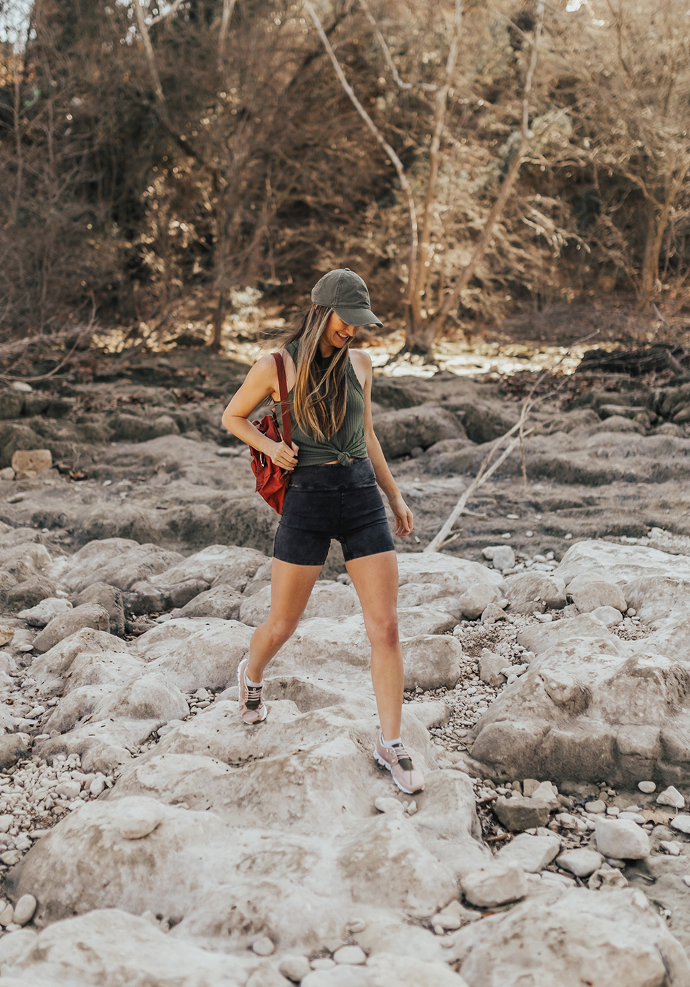 https://storage.googleapis.com/livvyland/2021/02/livvyland-blog-olivia-watson-austin-texas-lifestyle-fashion-blogger-greenbelt-hike-free-people-fp-movement-hot-shot-bike-shorts-1.jpg