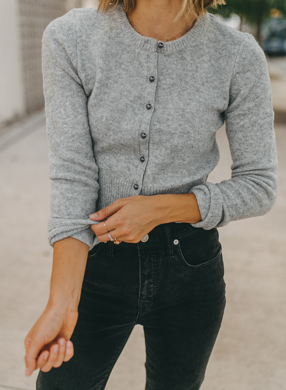 cropped chunky sweater worn over white button down tunic shirt, Louis  Vuitton totally MM tote, how to layer a cropped boxy sweater outfit -  Meagan's Moda