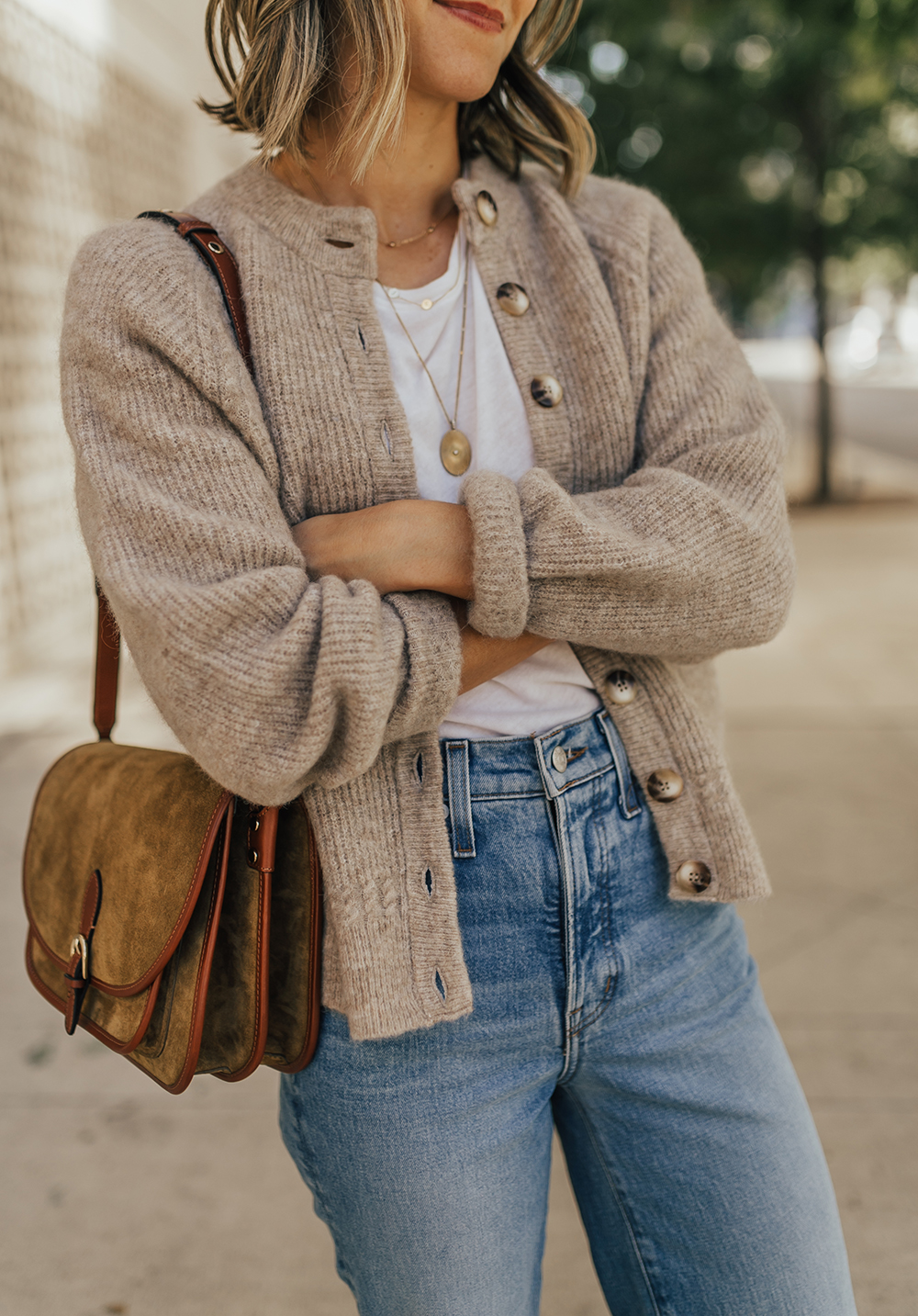 https://storage.googleapis.com/livvyland/2022/10/livvyland-blog-olivia-watson-austin-texas-fashion-blogger-oatmeal-cardigan-othello-sezane-romeo-suede-bag-6.jpg