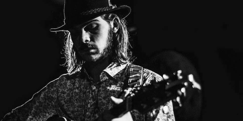 Juba's Tomcat, Musiciens Guitariste en représentation - photo de couverture n° 1