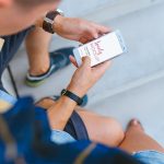 Man holding Xiaomi Mi5 in his hands