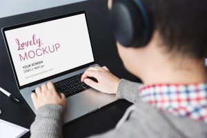 Developer Coding On His Macbook Pro Mockup