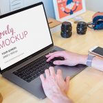 Space Gray Macbook Mockup On Photographers Desk