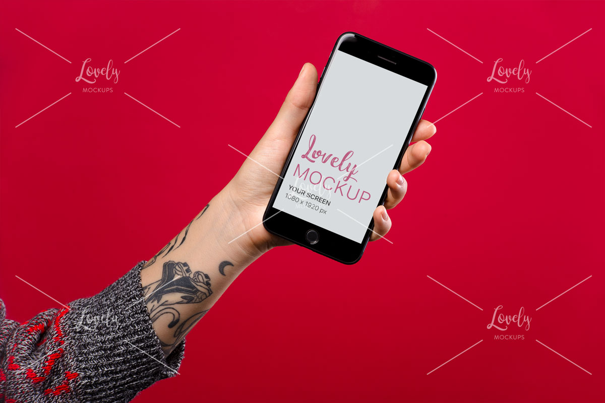 Download Mockup Featuring A Woman S Tattooed Arm Holding A Space Gray Iphone 8 Against A Red Surface Lovely Mockups PSD Mockup Templates