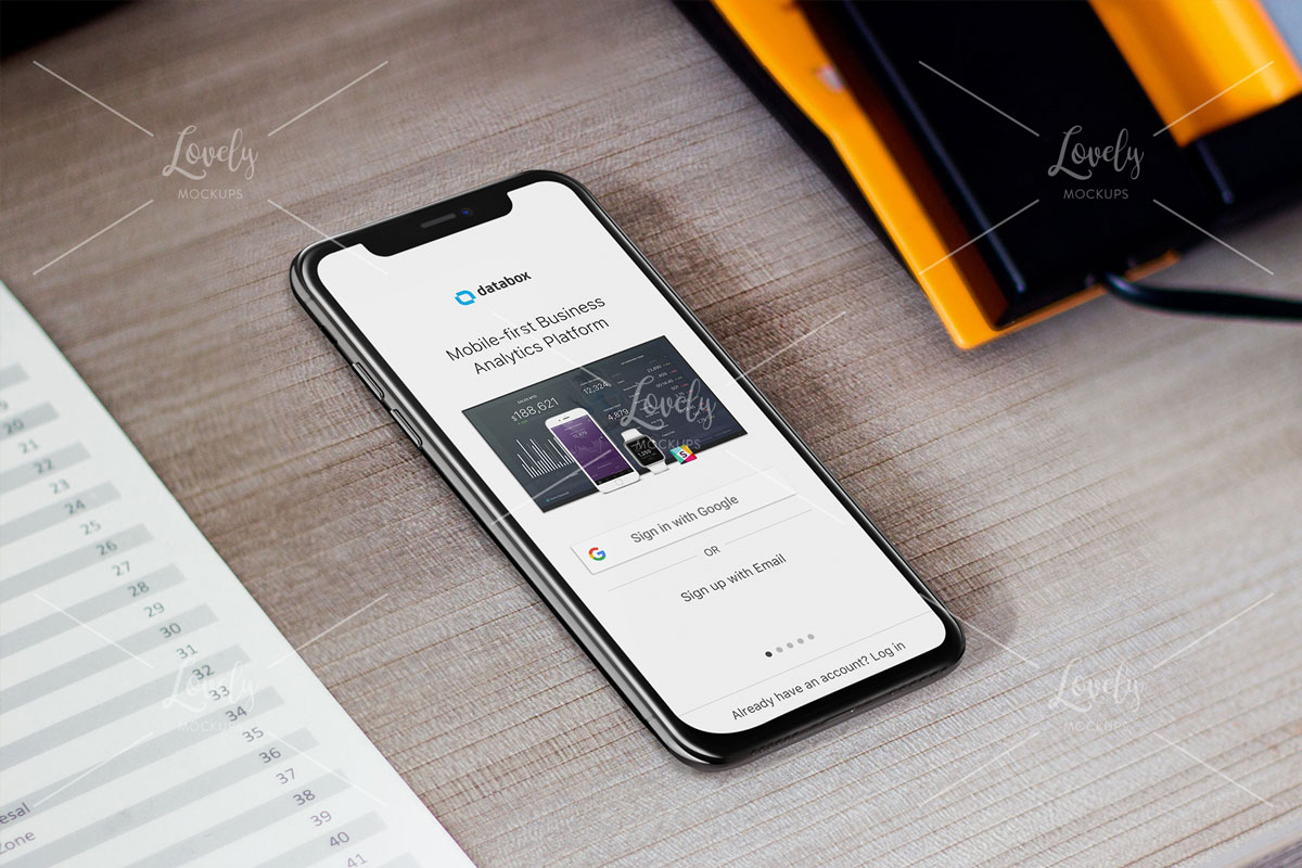 Download Space Gray iPhone X Mockup at a Hotel Desk - Lovely Mockups