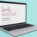 Silver MacBook Laptop Mockup Resting On a Colored Surface