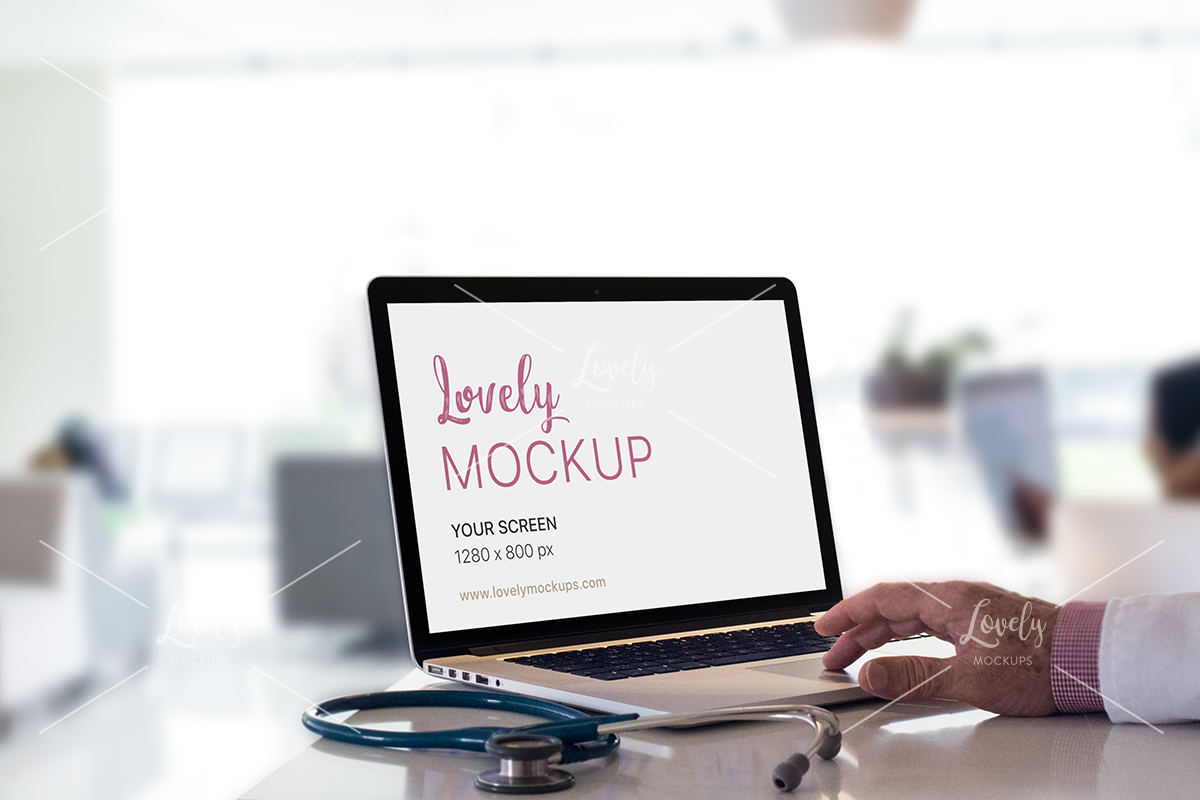 Download Mockup Of A Senior Doctor Working In A Mackbook Lovely Mockups