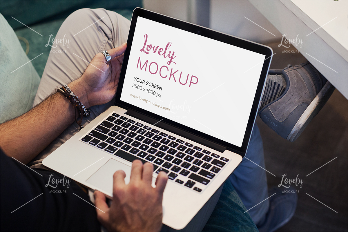 Download Macbook Mockup Featuring A Man Using His Laptop Lovely Mockups