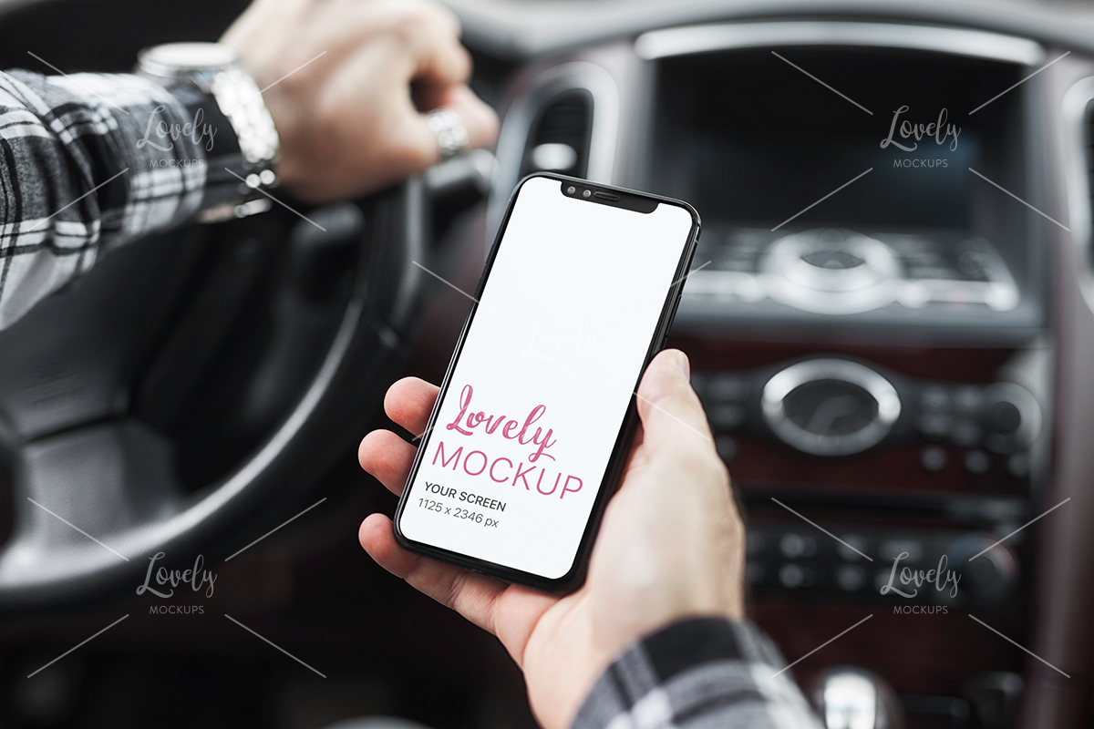 Download Mockup of a Man Holding an iPhone 11 in His Car - Lovely ...